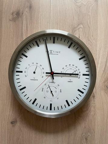 Nextime Wandklok met Weerstation beschikbaar voor biedingen