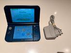 New Nintendo 3DS XL - (met kleine lichtvlekjes) + lader, Spelcomputers en Games, Ophalen of Verzenden, Gebruikt, Blauw, 3DS