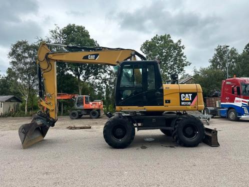 Cat M 313 D VAH (bj 2010), Zakelijke goederen, Machines en Bouw | Kranen en Graafmachines, Graafmachine