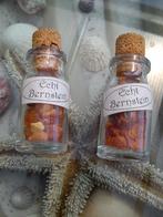 2 kleine flessen met amberstenen, Sieraden, Tassen en Uiterlijk, Edelstenen, Ophalen of Verzenden, Nieuw
