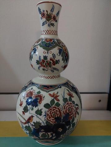 Vintage vaas met bloemmotief beschikbaar voor biedingen