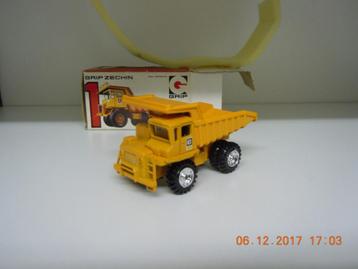 Cat 769B Dump Truck.  Model van het merk Grip. Model nieuw i beschikbaar voor biedingen