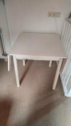 Witte uitklapbare (eet/schrijf) tafel, Ophalen