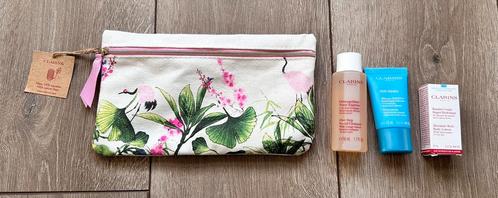 Leuk Make Up tasje van Clarins met nieuwe, luxe miniaturen, Sieraden, Tassen en Uiterlijk, Uiterlijk | Gezichtsverzorging, Nieuw