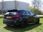 BMW 1-serie M135i xDrive M Aerodynamica 306 Pk - Automaat, A, 1998 cc, Gebruikt, Zwart, 4 cilinders