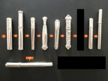 Diverse antieke zilveren naaldenkokers beschikbaar voor biedingen