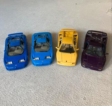 4 Modelauto's 1:18 - Zie omschrijving en foto’s beschikbaar voor biedingen