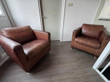Twee prachtige Minotti fauteuils in cognac leer beschikbaar voor biedingen