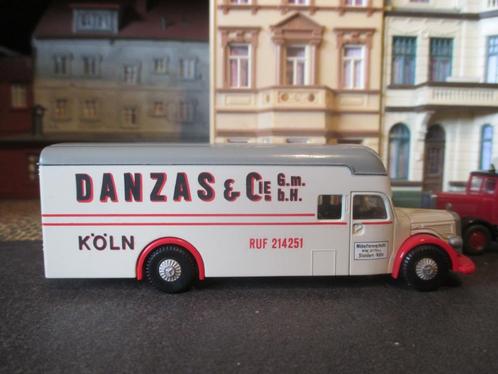 1951 Mercedes Benz O6600 - Brekina Danzas Meubeltransport, Hobby en Vrije tijd, Modelauto's | 1:87, Nieuw, Auto, Brekina, Ophalen of Verzenden