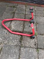 Paddockstand achter, Ophalen