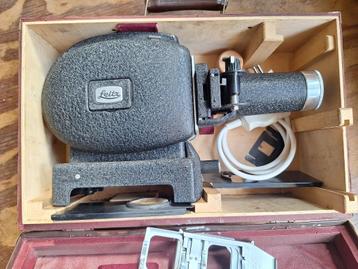 Leitz projector met filmpjes beschikbaar voor biedingen
