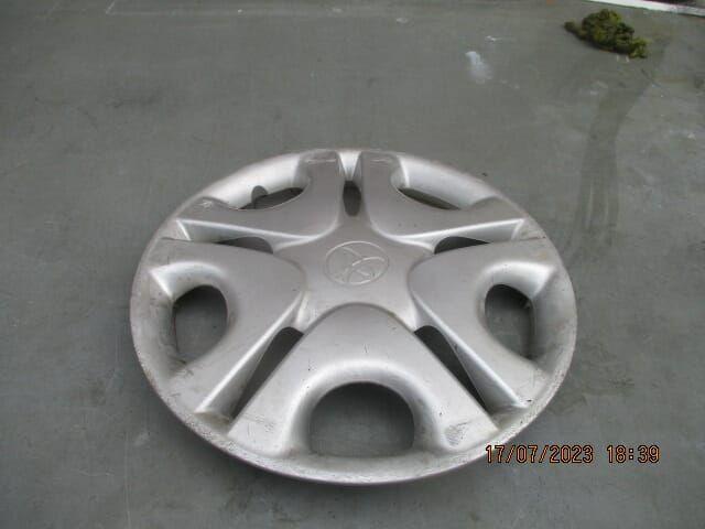 een wieldop corolla E 11 ..... 14 inch, Auto-onderdelen, Ophanging en Onderstel, Toyota, Gebruikt, Ophalen of Verzenden