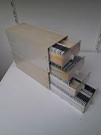 Dia's met sleden en raampjes, Ophalen