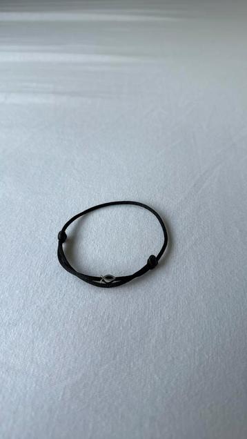 Petit Collection armband met zilveren bedel beschikbaar voor biedingen