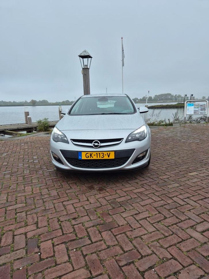 Opel Astra 1.4 Turbo Ecotec 140pk 2013 Grijs, Auto's, Opel, Particulier, Astra, ABS, Airbags, Airconditioning, Bluetooth, Centrale vergrendeling