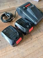 Bosch acculader en 2 accu's, Ophalen of Verzenden, Zo goed als nieuw, Boor- en Schroefmachine