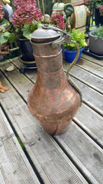 Te koop antieke koperen waterkan beschikbaar voor biedingen