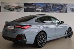BMW i4 M50 High Executive | M Sportpakket Pro | Glazen schui, Auto's, Stof, 520 km, Met garantie (alle), 2190 kg