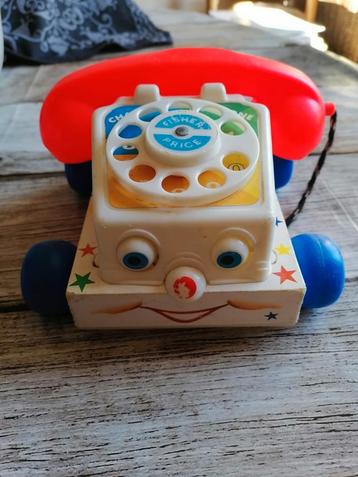 Vintage speeltelefoontje op wieltjes, Fischer Price,  beschikbaar voor biedingen