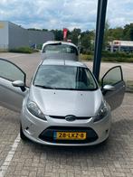 Ford Fiësta 1.25 44KW 3DR 2010 Grijs, Auto's, Ford, Voorwielaandrijving, Euro 5, Stof, 4 cilinders