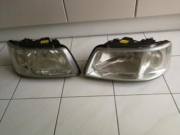 Origineel Volkswagen T5 koplamp links en rechts beschikbaar voor biedingen