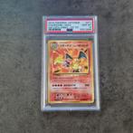 Charizard 20th Anniversary 1st Edition Jap PSA 10, Hobby en Vrije tijd, Ophalen of Verzenden, Zo goed als nieuw, Losse kaart
