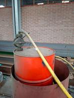 Gebruikte olievat met pomp, Ophalen, Gebruikt