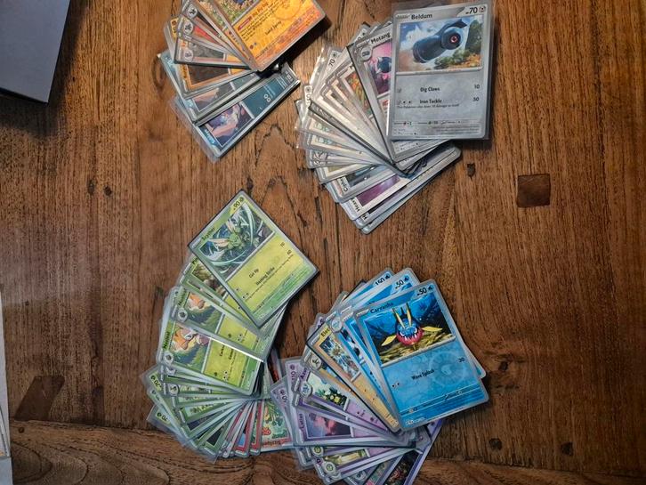 Reverse holo & foil temporal forces, Hobby en Vrije tijd, Verzamelkaartspellen | Pokémon, Zo goed als nieuw, Meerdere kaarten