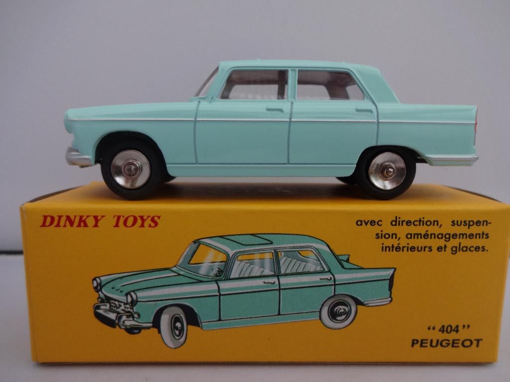 Peugeot 404 licht blauw nr: 553 van Dinky Toys 1:43, Hobby en Vrije tijd, Modelauto's | 1:43, Ophalen of Verzenden, Nieuw, Auto