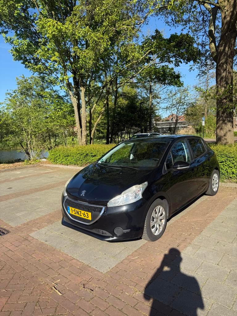 Peugeot 208 1.2 VTI 60KW/82PK 5-D 2013 Zwart, Auto's, Peugeot, Voorwielaandrijving, 31 €/maand, 1199 cc, Zwart