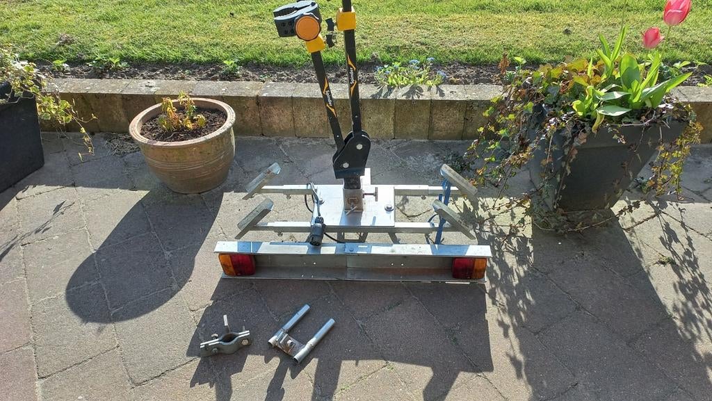 Fietsendrager Spinder, Ophalen