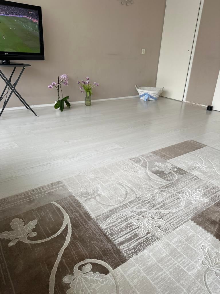 Licht laminaat 65m2 zelf er uithalen, Huis en Inrichting, Stoffering | Vloerbedekking, Gebruikt, Wit, Ophalen of Verzenden, Luks