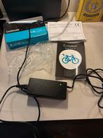 E-Motion Accu Oplader Elektrische Fiets, Fietsen en Brommers, Fietsaccessoires | Fietsaccu's, Ophalen of Verzenden, Zo goed als nieuw