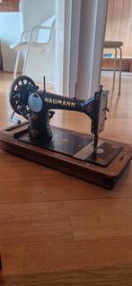 Nauman naaimachine, Ophalen