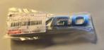 TOYOT AYGO Embleem  75442-0H010, Auto diversen, Tuning en Styling, Ophalen of Verzenden