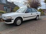Te koop in  nieuwstaat verkerende Toyota Carina, 4 cilinders, Wit, Handgeschakeld, Grijs