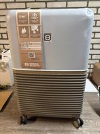 Grote koffer met deuk