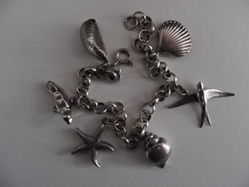 ZILVEREN ARMBAND MET STRANDBEDELTJES beschikbaar voor biedingen