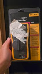 Fluke 113 multimeter nieuw + Hanging kit + Soft Case C25, Ophalen of Verzenden, Nieuw, Elektriciteit