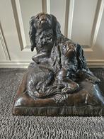 Bronzen beeld honden, Ophalen