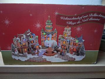 Groot Kerstdorp met verlichting en muziek   beschikbaar voor biedingen