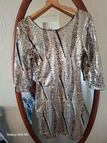 Glitterjurk/Pailletten.  beschikbaar voor biedingen
