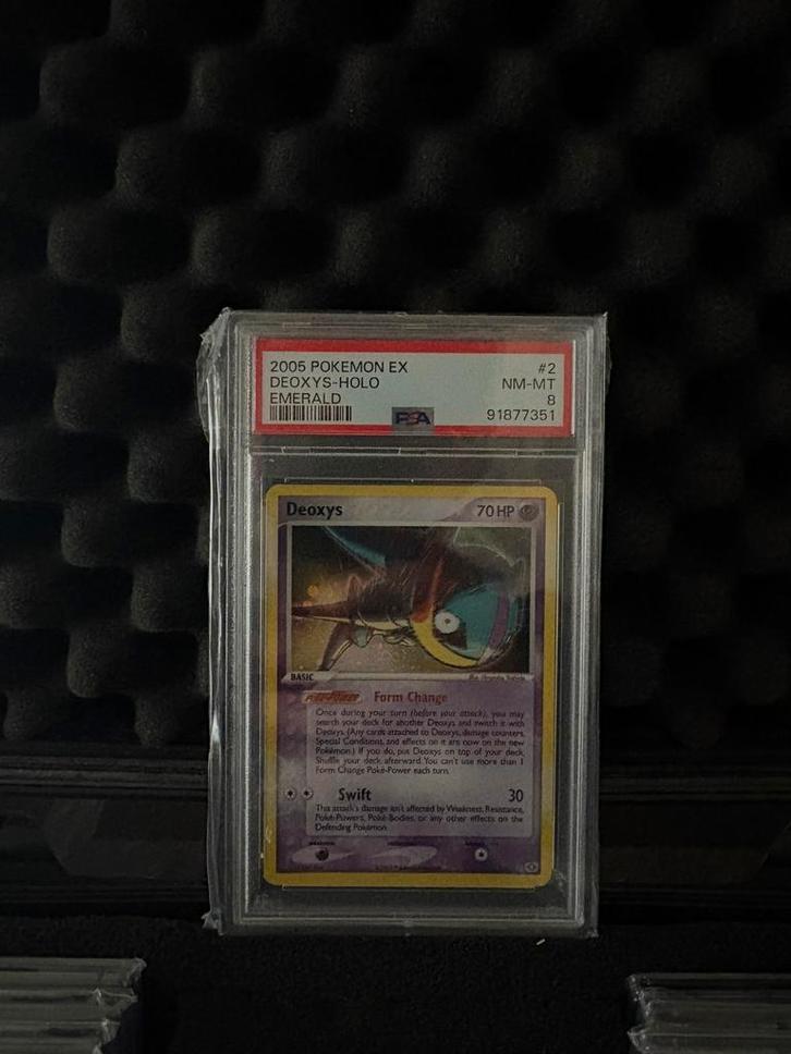 Deoxys holo emerald (psa 8), Hobby en Vrije tijd, Verzamelkaartspellen | Pokémon, Zo goed als nieuw, Ophalen of Verzenden
