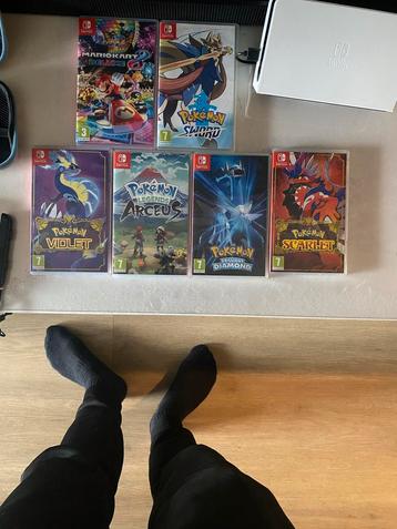 Nintendo Switch OLED + 5 Games beschikbaar voor biedingen