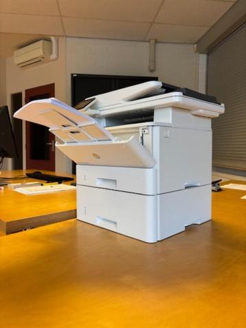 All in one laserprinter HP met extra papierlade beschikbaar voor biedingen