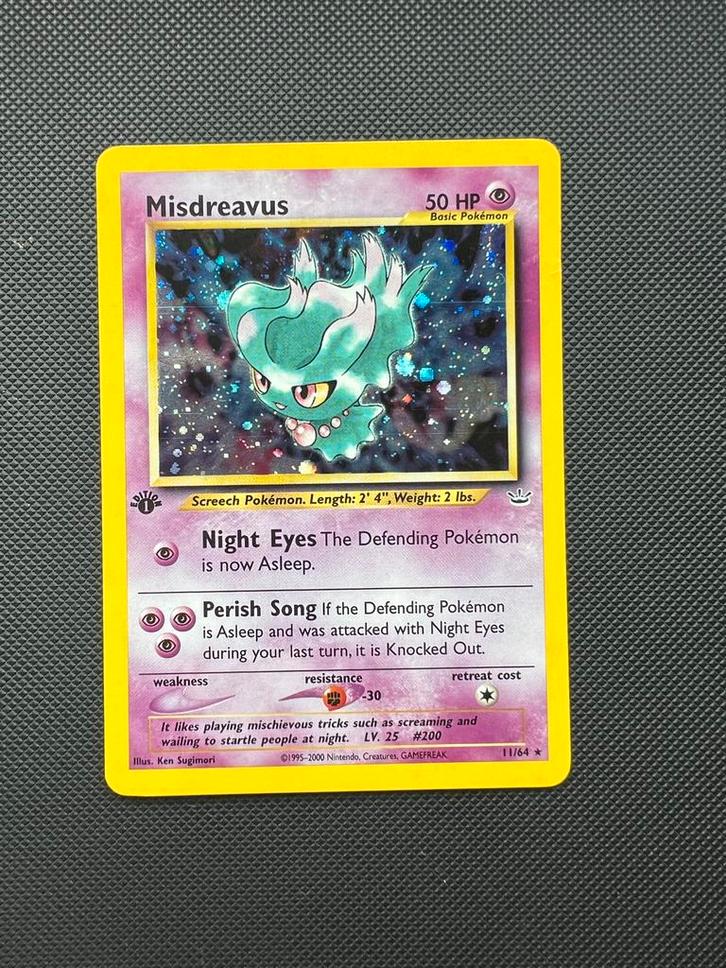 Misdreavus 1st Edition Neo Revelation 11/64, Hobby en Vrije tijd, Verzamelkaartspellen | Pokémon, Zo goed als nieuw, Ophalen of Verzenden
