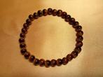 Tijgeroog steen armband., Sieraden, Tassen en Uiterlijk, Armbanden, Ophalen of Verzenden, Nieuw, Geel, Overige materialen