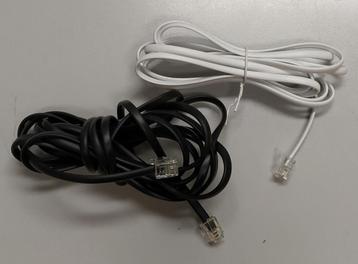 Te Koop: Telefoonkabels met RJ11 stekkers.    beschikbaar voor biedingen