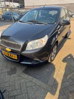 Chevrolet Aveo 1.2 16V 5D 2010 Zwart, Auto's, Voorwielaandrijving, Stof, Aveo, 4 cilinders
