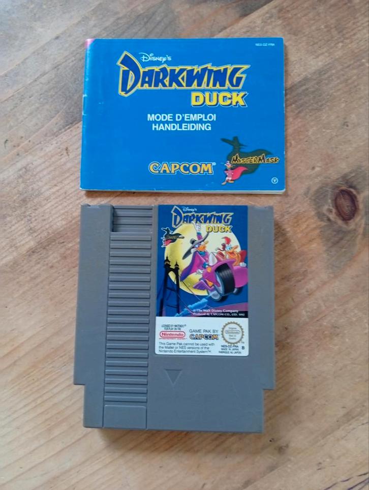 Darkwing Duck Nintendo Nes met boekje in superstaat, Spelcomputers en Games, Games | Nintendo NES, Zo goed als nieuw, Avontuur en Actie